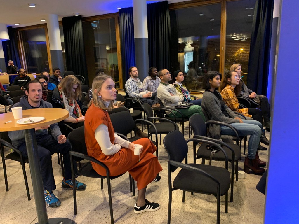 Audience members listening during an Entergrate event