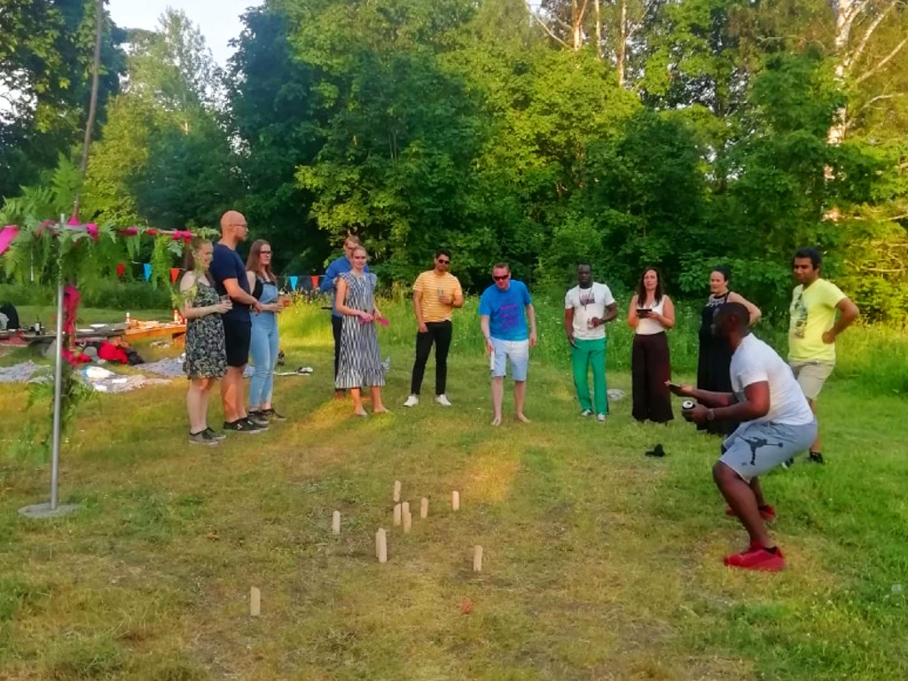 Entergrate community members playing an outdoor game