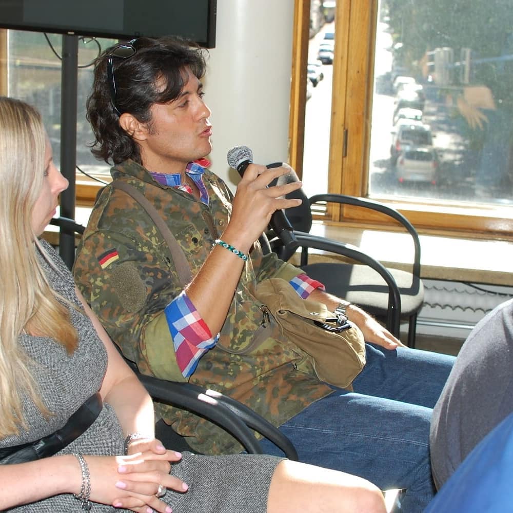 Audience member speaking into a microphone